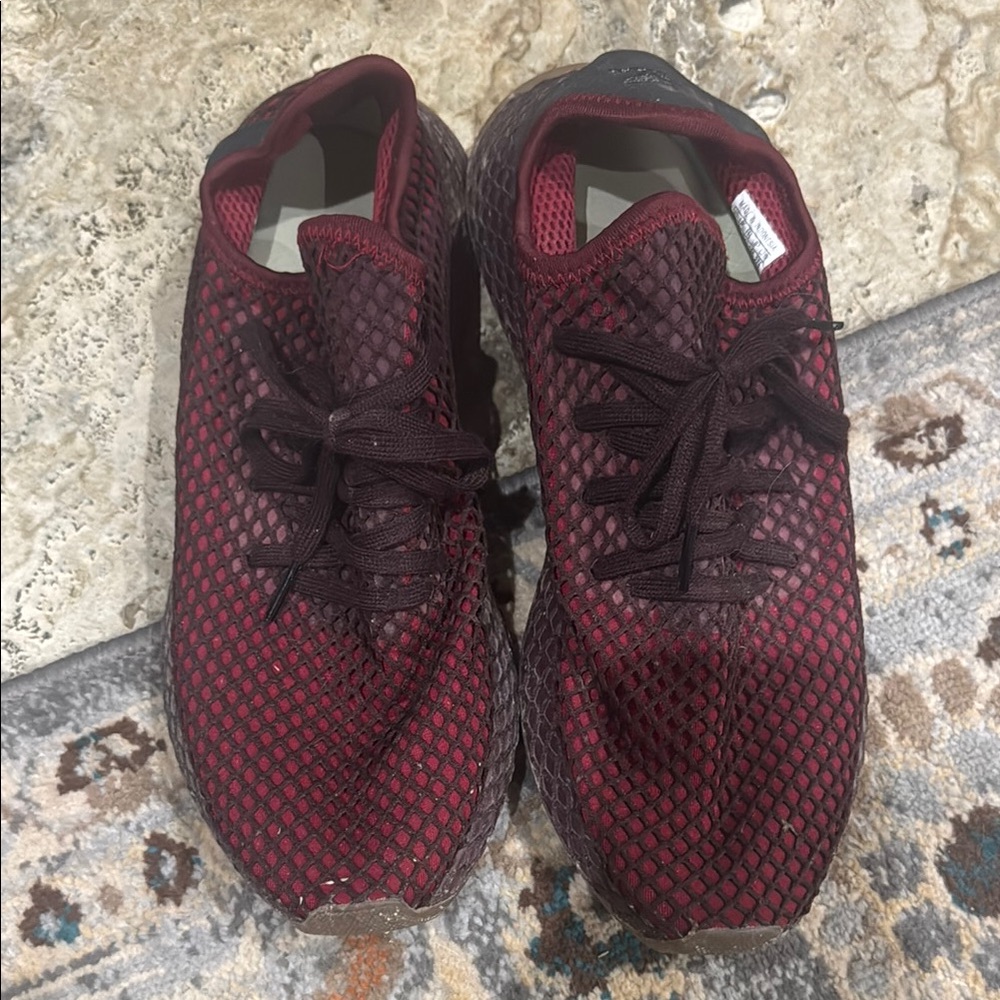 Adidas Red Athletic Shoes with Breathable Mesh and Contrasting Sole